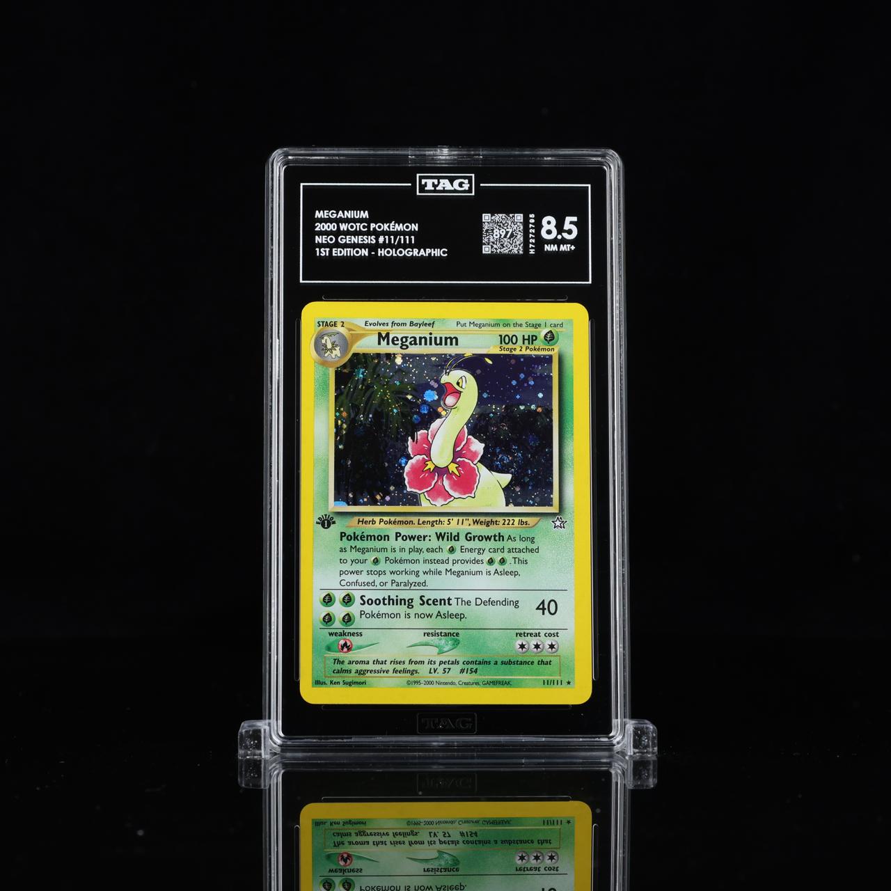 TAG graded Meganium Pokemon slab photographed on a black reflective surface